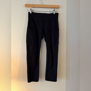 EUC Lululemon speed up crop 21” Black womans leggings size 4